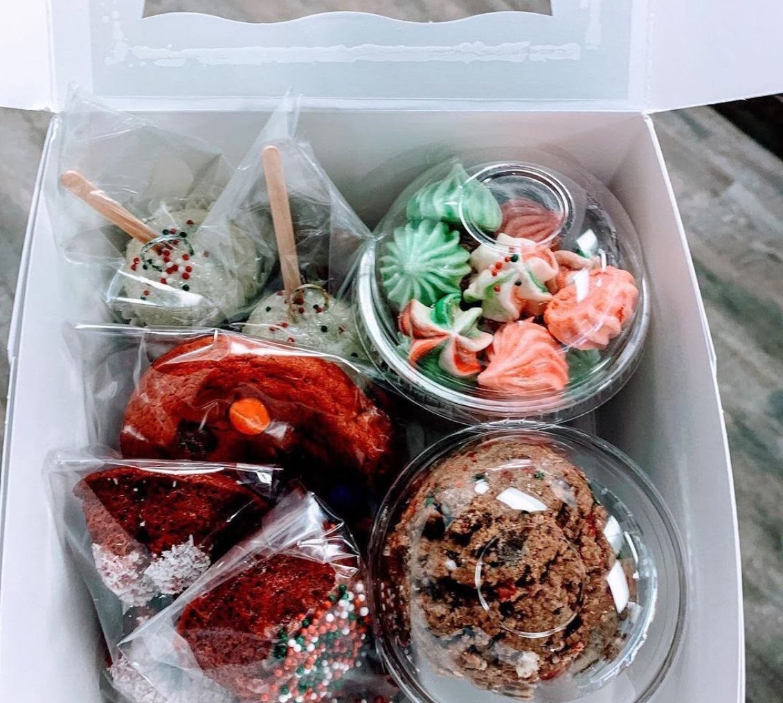 A holiday gift box of cookies, meringues and cupcakes