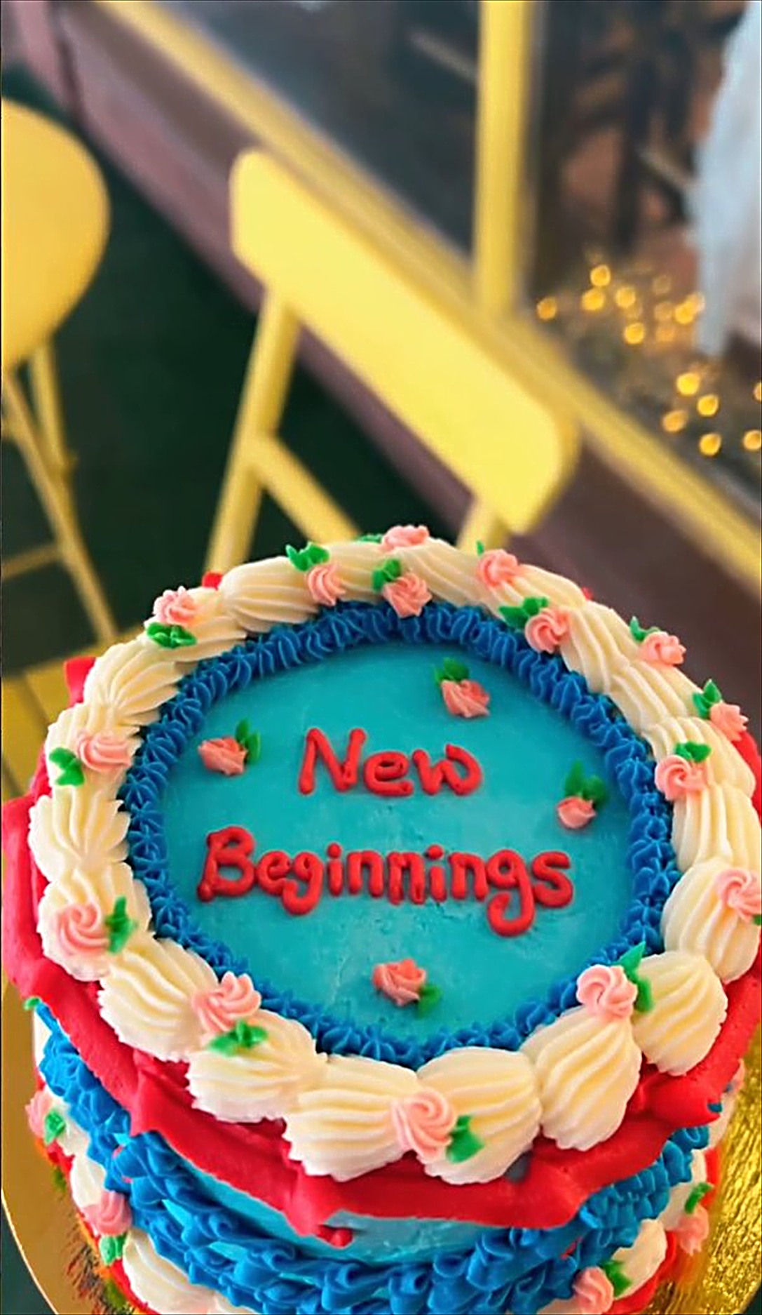 Blue and red vintage cake reading New Beginnings